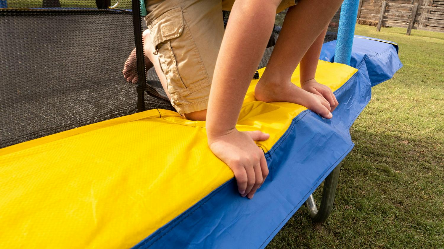 Jumpking Rectangle 10 x 14' Trampoline, with Enclosure, Blue/Yellow - Image 9