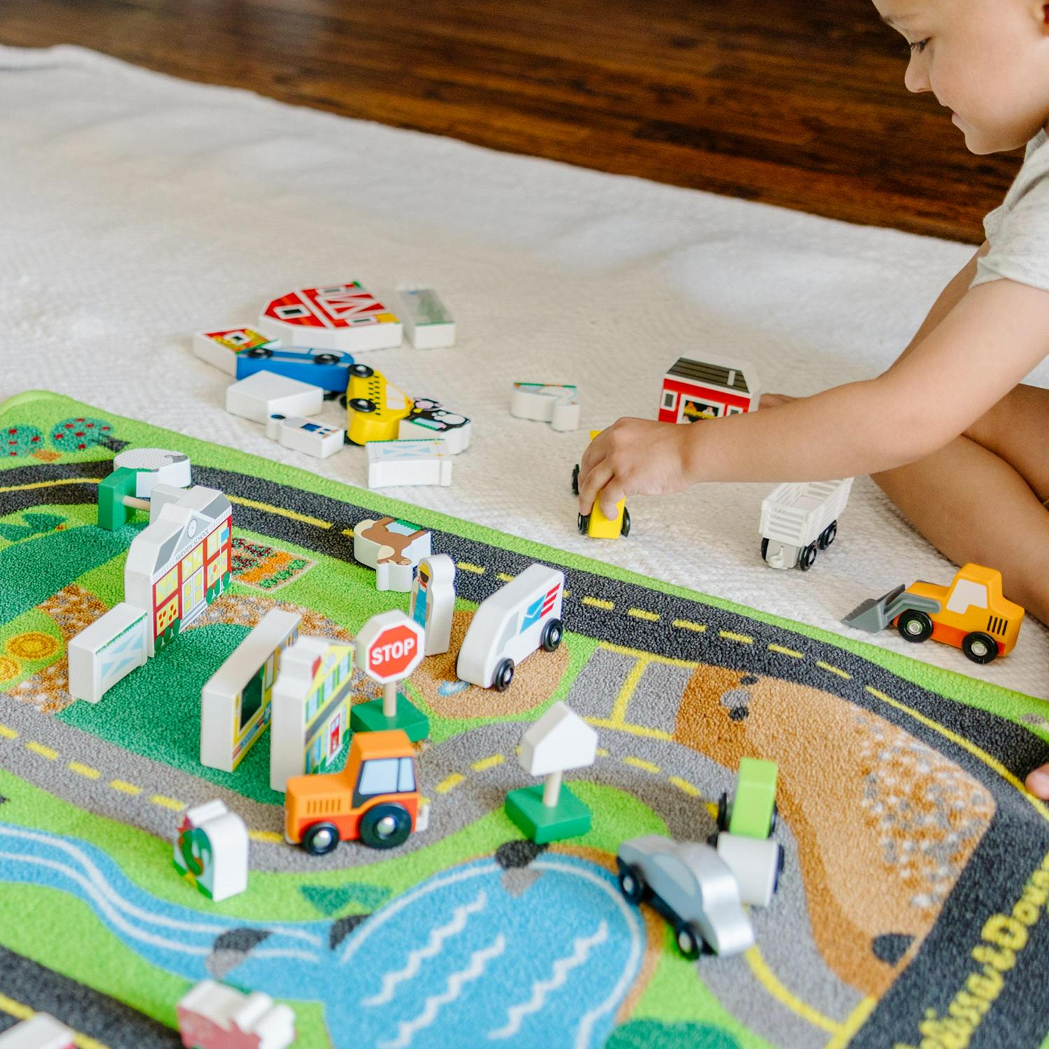 Melissa & Doug Deluxe Activity Road Rug Play Set with 49 Wooden Vehicles and Play Pieces - Image 7