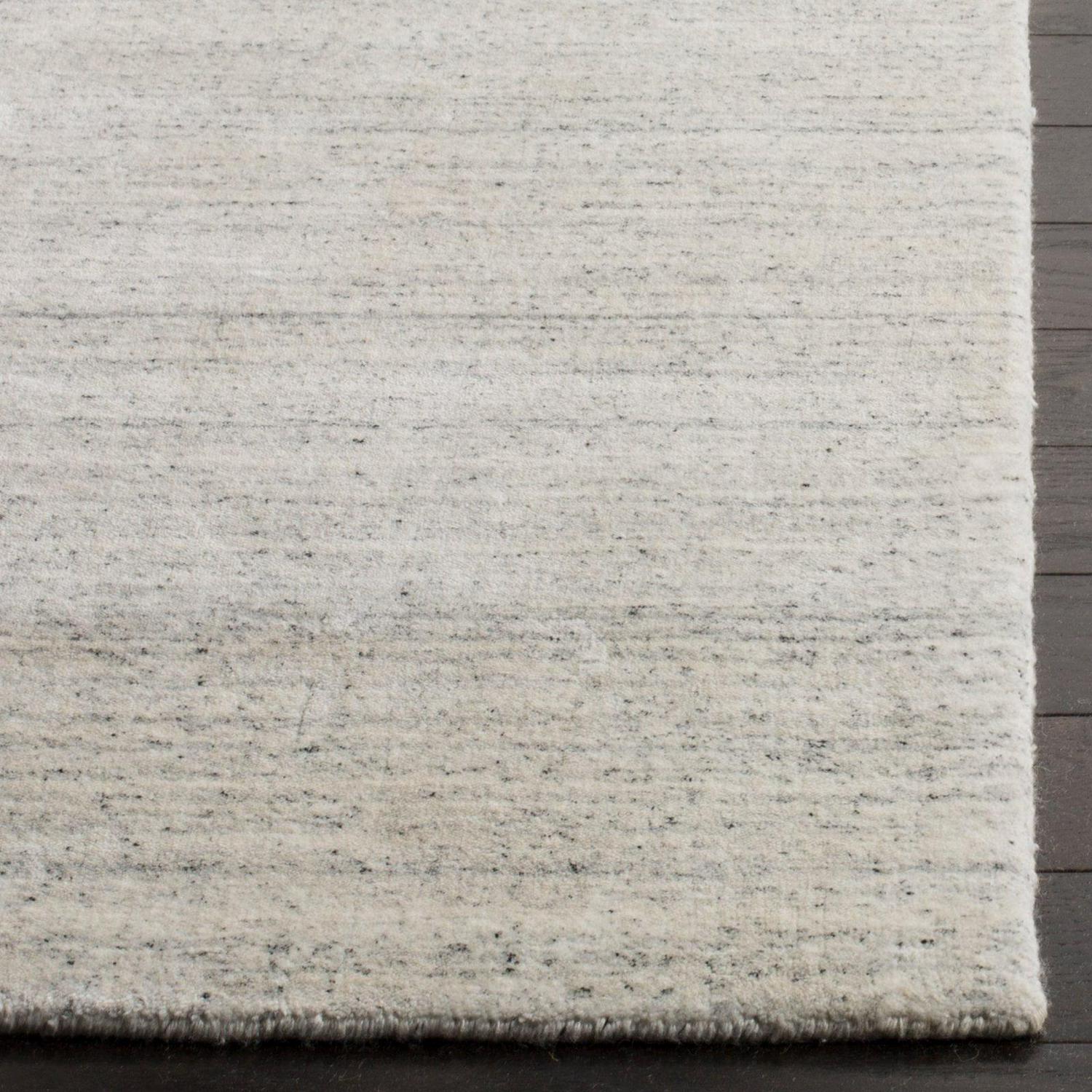 SAFAVIEH Mirage Branislav Solid Area Rug, Sky, 6' x 9' - Image 3